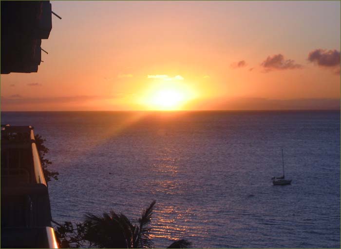 Unbelievable sunset on the white sand beaches of Hawaiian.